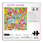 The Family Hoppin’ Around Puzzle by Chronicle Books features a colorful illustrated box depicting a whimsical spring scene with rabbits, flowers, decorated eggs, and houses. Designed by Jenny Miriam, this delightful 500-piece puzzle is perfect for ages 8-99 and promises family fun and springtime enjoyment.