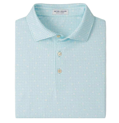 A folded light blue Peter Millar Ashgrove Performance Jersey Polo features a small geometric pattern, three-button placket, and four-way stretch for comfort and ease of movement.