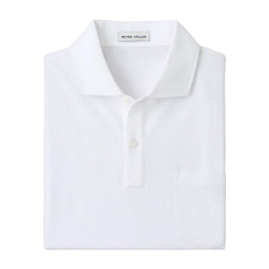 A white Everyday Pique Polo by Peter Millar, made of cotton piqué, features a spread collar, three-button placket, chest pocket, and "Peter Millar" label on the inside collar.