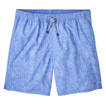 The Peter Millar Tequila Seas Swim Trunk features a light blue color with a white and pink abstract pattern, quick-drying fabric, elastic drawstring waistband, and mesh liner, shown on a white background.