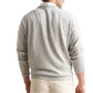 A man is seen from behind wearing a light gray Peter Millar Montauk Crewneck Sweater and light-colored pants against a white background.