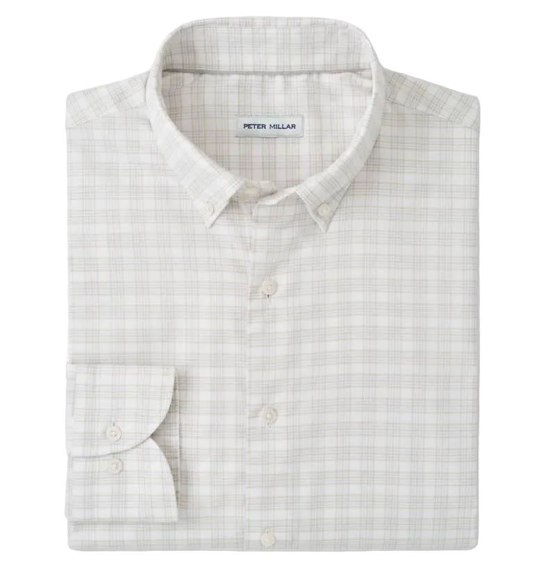 The Peter Millar Douglas Crown Lite Cotton-Stretch Sport Shirt is a light plaid, long-sleeve twill button-up, neatly folded with the "Peter Millar" label visible, crafted from easy-care stretch cotton for comfort and style.