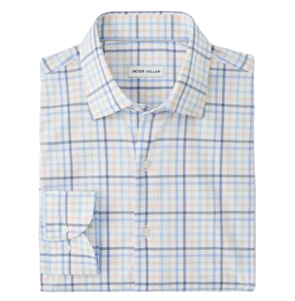 The Peter Millar Warren Crown Lite Cotton-Stretch Sport Shirt is a folded long-sleeve button-up with a light blue, orange, and white plaid pattern, a front pocket, and an easy-care label inside the collar.