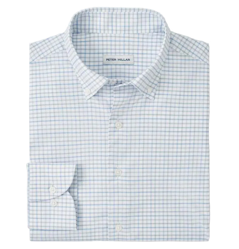 The Rommel Performance Twill Sport Shirt by Peter Millar features a light blue and white check, UPF 50+ performance fabric, and a visible "Peter Millar" label on the inside collar.