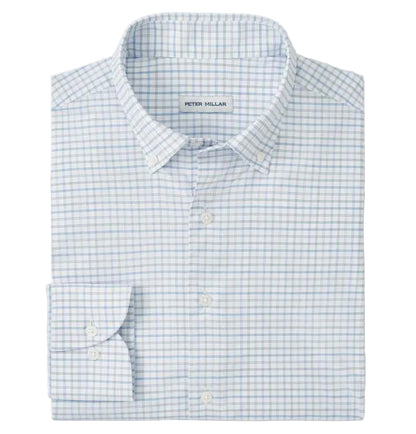 The Rommel Performance Twill Sport Shirt by Peter Millar features a light blue and white check, UPF 50+ performance fabric, and a visible "Peter Millar" label on the inside collar.