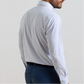 A man is shown from the back against a plain background wearing the Peter Millar Rommel Performance Twill Sport Shirt, a light-colored, long-sleeve checkered shirt crafted with performance fabric for comfort and durability, paired with blue dress pants.