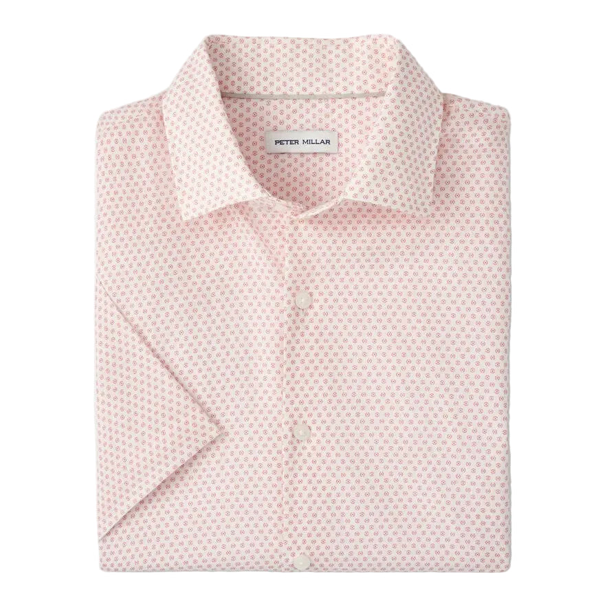 The Tamarama Cotton Lyocell Sport Shirt by Peter Millar is a light pink, featherweight, short-sleeve button-up featuring a small repeating geometric pattern and a visible "Peter Millar" label inside the collar.