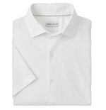 A neatly folded Peter Millar Seaward Cotton Lyocell Sport Shirt with short sleeves, a collar, and a visible inside brand label.