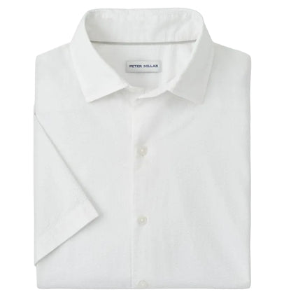 A neatly folded Peter Millar Seaward Cotton Lyocell Sport Shirt with short sleeves, a collar, and a visible inside brand label.