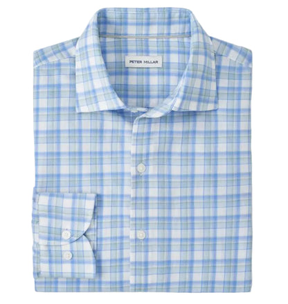 A folded Peter Millar Waterrock Cotton Lyocell Sport Shirt features blue, green, and white plaid, long sleeves, button-down front, and featherweight fabric for all-day comfort.