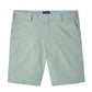 The Peter Millar Surge Linen-Blend Performance Short in light green features front pockets, belt loops, a button closure, and breathable fabric for all-day comfort and style. Displayed on a white background.