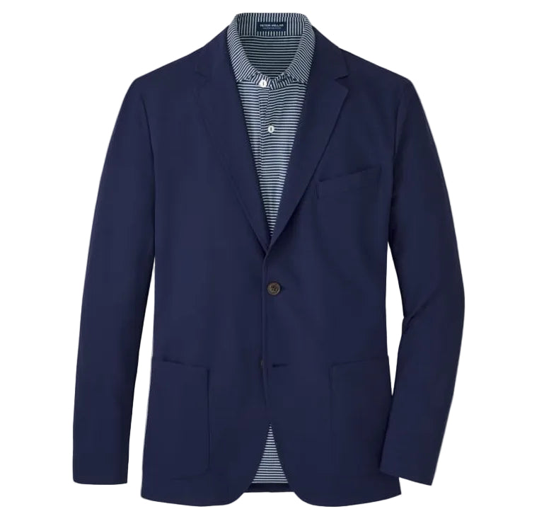 The Peter Millar Bingham Performance Blazer, in navy blue with notch lapels, two front pockets and single-button closure, is crafted from ultra-lightweight fabric and styled over a blue and white striped collared shirt.