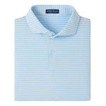 The Peter Millar Keynote Performance Jersey Polo is a folded light blue shirt with white stripes, featuring four-way stretch, UPF 50+ protection, and an inside collar label.