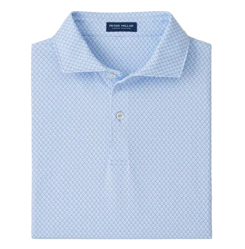 A neatly folded Peter Millar Mayfield Performance Jersey Polo in light blue, featuring a subtle geometric pattern, classic collar, and four-way stretch for all-day comfort.