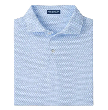 A neatly folded Peter Millar Mayfield Performance Jersey Polo in light blue, featuring a subtle geometric pattern, classic collar, and four-way stretch for all-day comfort.