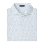 The Peter Millar Melody Sea Performance Jersey Polo is a light blue and white patterned short-sleeve shirt with a collar and two buttons, neatly folded. It offers comfortable four-way stretch for ease of movement.