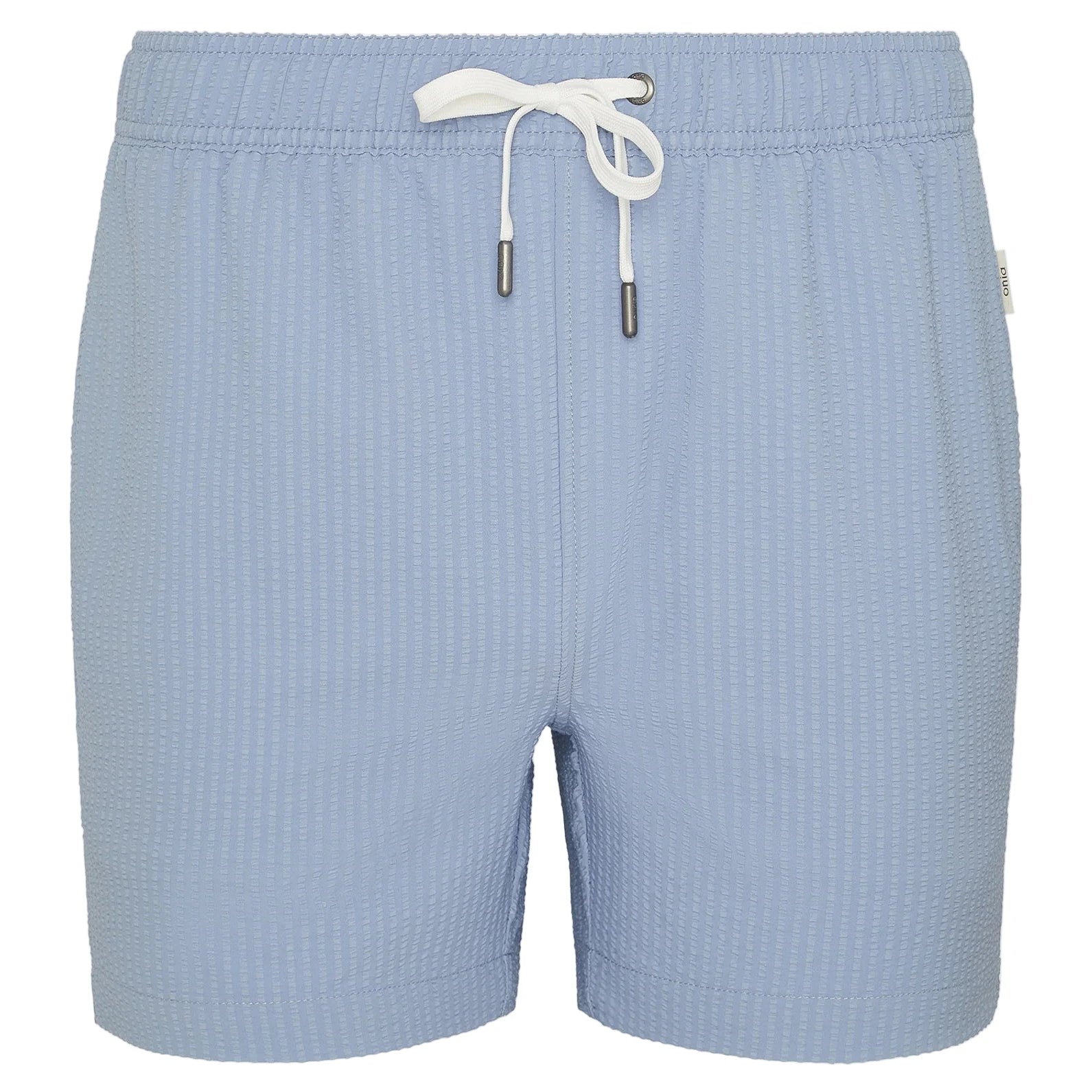 The Onia Charles 5" Swim Trunk features a light blue color, drawstring waist, and subtle textured pattern. Made from quick-dry fabric, it's shown here against a white background.