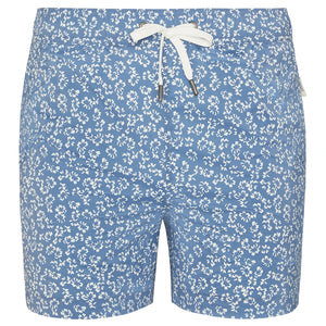 The Charles 5" Swim Trunk by Onia features a white floral pattern, white drawstring at the waist, and quick-dry fabric, shown against a plain background.