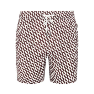 The Charles 7″ Swim Trunk by Onia features a brown and white geometric pattern and is crafted from quick-dry swim fabric, complete with a white drawstring waistband. Shown against a plain white background.