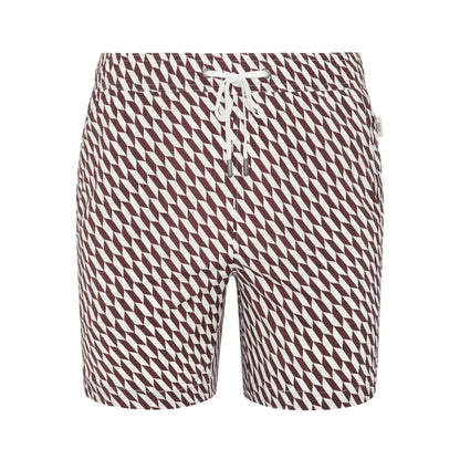 The Charles 7″ Swim Trunk by Onia features a brown and white geometric pattern and is crafted from quick-dry swim fabric, complete with a white drawstring waistband. Shown against a plain white background.