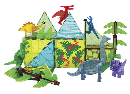 The Magnatiles Dino World XL 50 Piece Set features colorful translucent magnetic tiles assembled with plastic plant figures and dinosaurs, including a pterodactyl, stegosaurus, and brontosaurus.