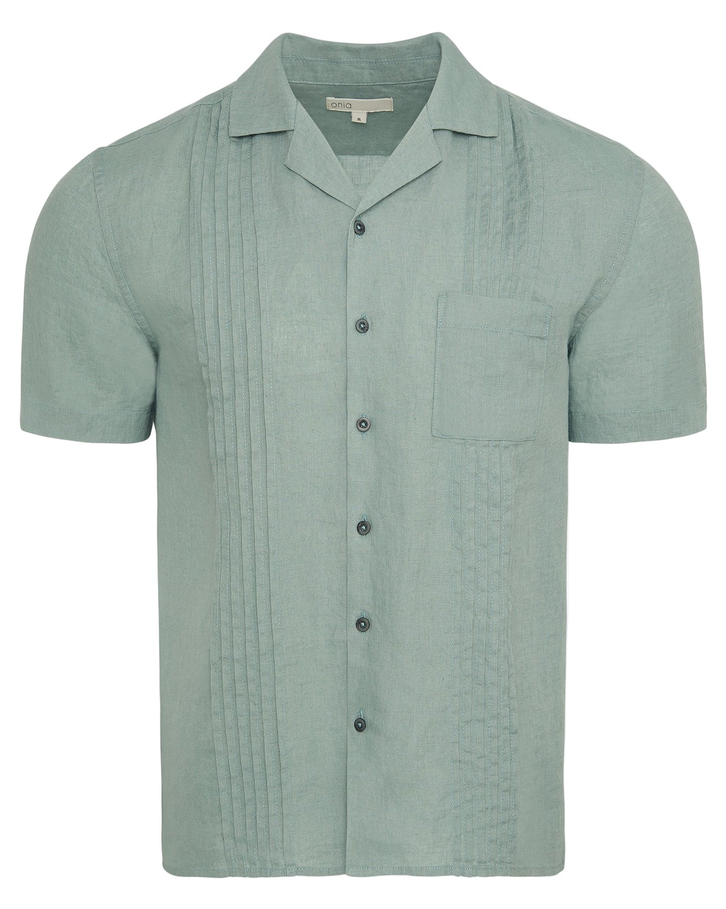 The Linen Pintuck Camp Shirt by Onia is a light green, pure linen short-sleeve shirt featuring a chest pocket and vertical pintuck pleats on the front.