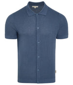 The Onia Drop Needle Button Up is a short-sleeve, collared blue cotton knit shirt featuring a subtle drop-needle texture—ideal for casual wear.