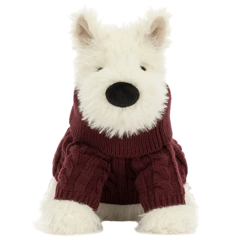 The Jellycat Munro Scottie Dog Winter Jumper Outfit, with a black nose and maroon jumper, sits upright against a plain white background.