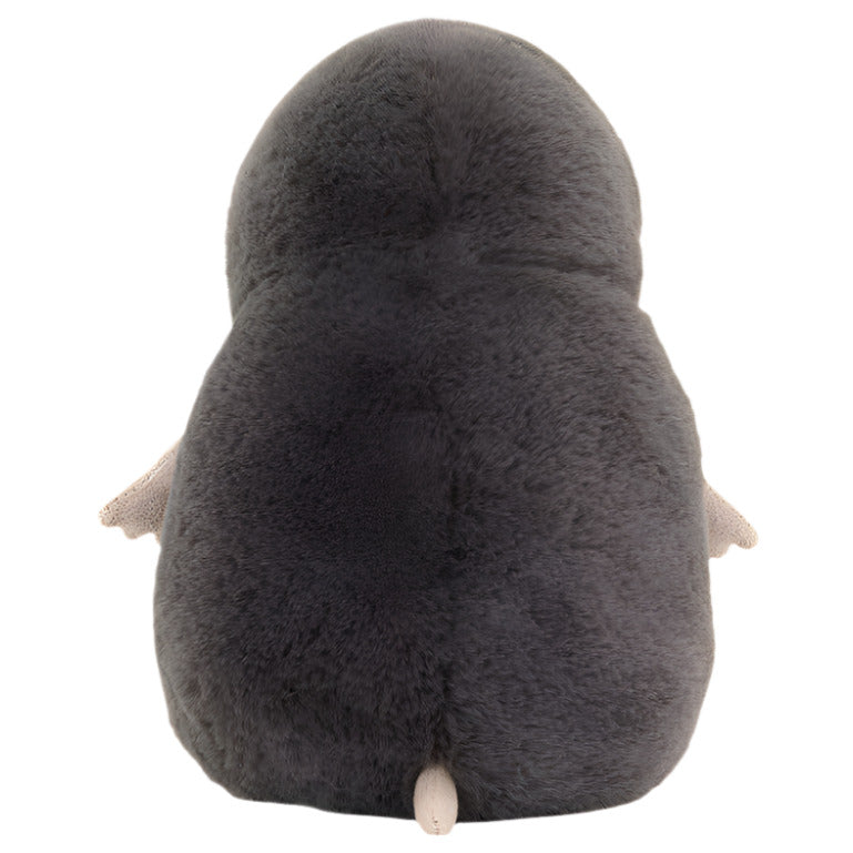 A plush Muswell Mole toy from Jellycat, featuring soft dark grey fur and small light brown feet, shown from the back.