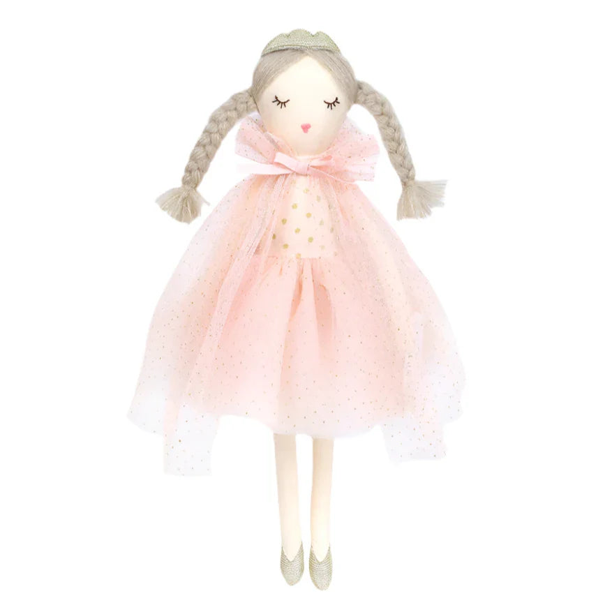 The Mon Ami Madeline Princess Doll features braided blonde hair, closed eyes, a light pink tulle dress and cape with gold accents, and sparkly shoes.