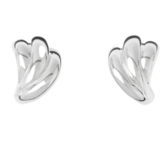 The Magda Earrings by Lie Studio are crafted in polished sterling silver with an abstract, curved design inspired by vintage silhouettes, shown against a white background.