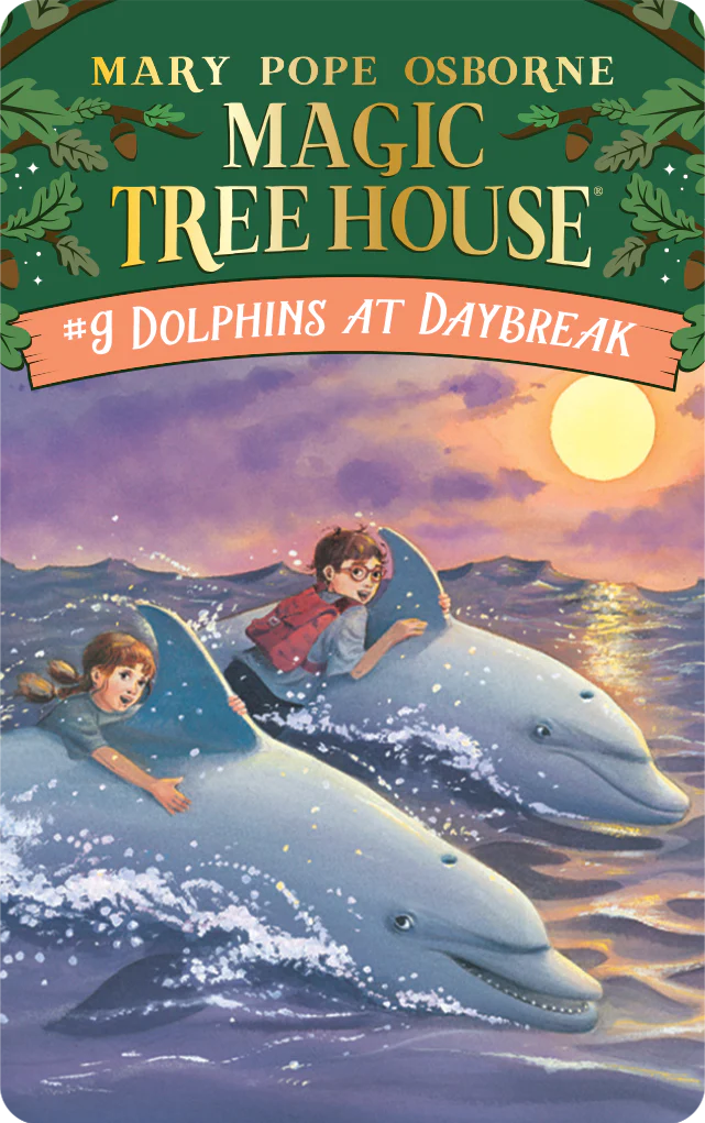 The cover of "Yoto Card: The Magic Tree House Collection 2" by Yoto depicts Jack and Annie joyfully riding dolphins in the ocean at sunrise.