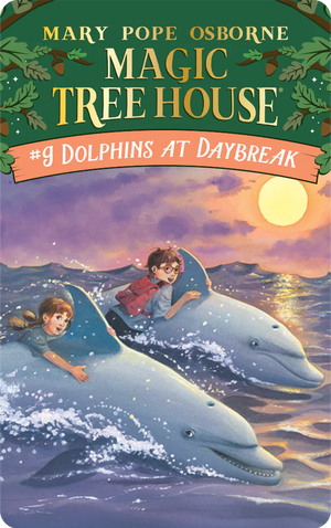 The cover of "Yoto Card: The Magic Tree House Collection 2" by Yoto depicts Jack and Annie joyfully riding dolphins in the ocean at sunrise.