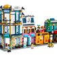 This vibrant LEGO® Creator Main Street from Legos - Toyhouse showcases a meticulously designed street scene complete with various shops, a café, and several minifigures engaging in front of the buildings. This 3in1 building toy offers endless creative possibilities for all ages.