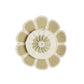 The Manhattan Hat by Lorna Murray is a round, flower-inspired cushion featuring textured, petal-like segments and a central fabric circle in beige and light green shades reminiscent of classic sun hats, shown against a plain white background.