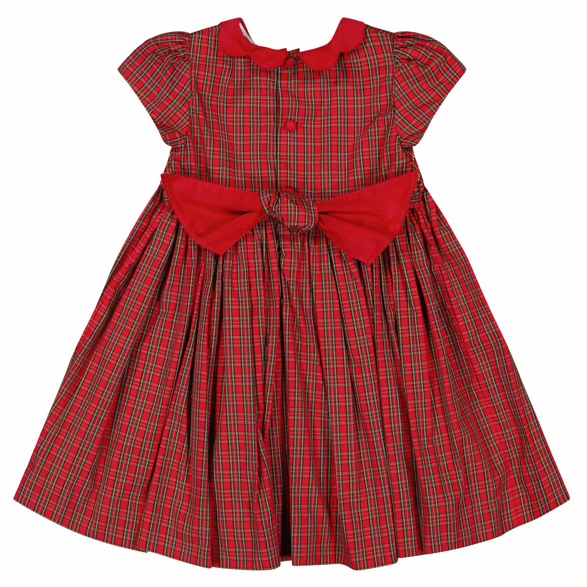 The Antoinette Baby Girls' and Girls' Marguerite Red Tartan Smocked Dress features festive red and green plaid, a red collar, matching buttons, and a large red bow at the waist—perfect for holiday celebrations.