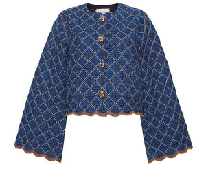 The Cara Cara Marvis Jacket is a blue quilted denim piece featuring a diamond pattern, flared sleeves, large buttons, and scalloped trim on the hem and cuffs.