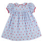 The Beaufort Bonnet Company’s Girls' Mary Dal Dress in light blue features short sleeves, a Peter Pan collar, red rickrack trim, and an all-over small red apple print—a sweet “Apple of My Eye” look.