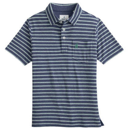 Experience the timeless elegance of Johnnie-O's Matthis Polo. This navy top features classic white stripes, a structured collar, buttons, and a practical chest pocket, all crafted from original fabric for ultimate comfort and style.