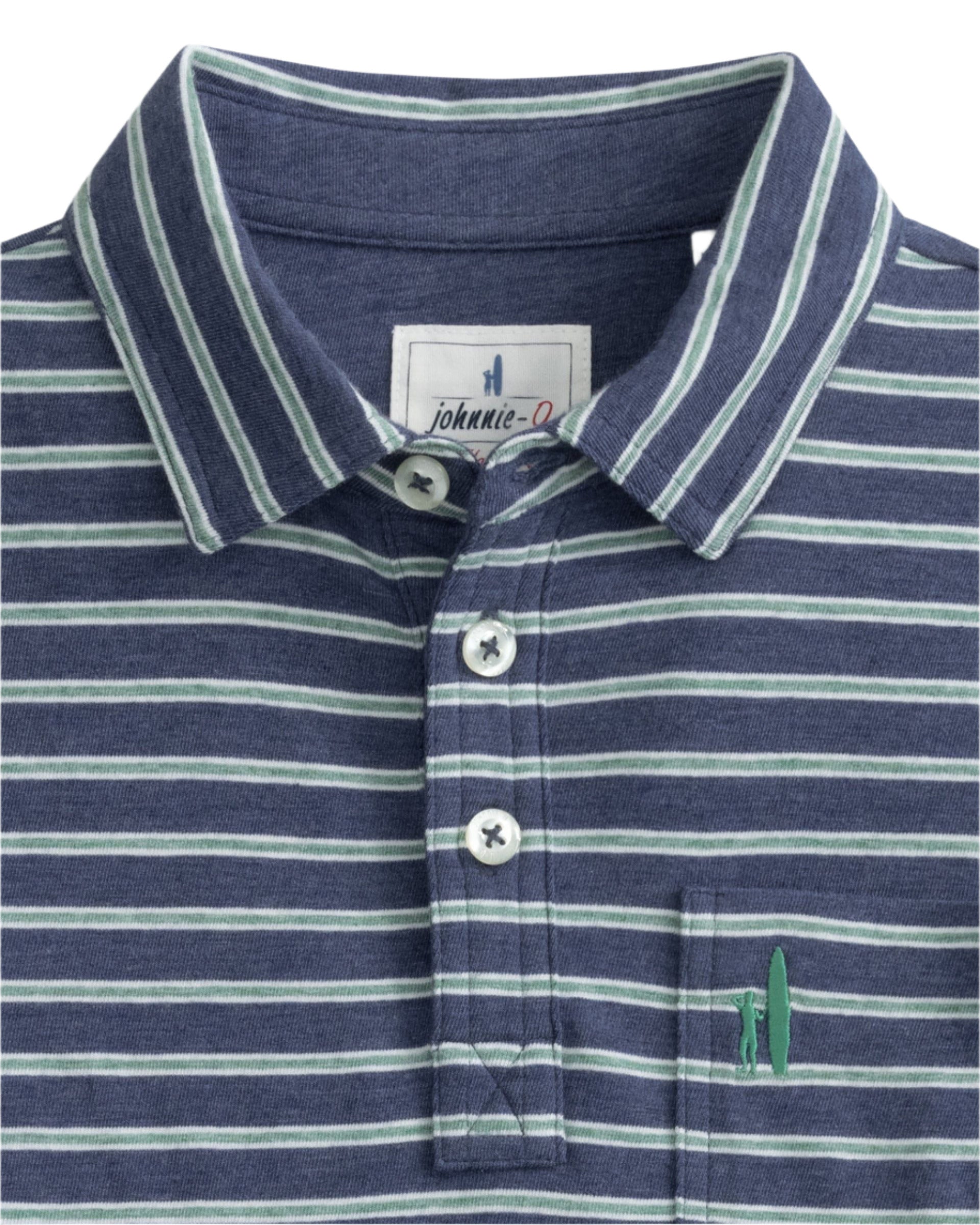 The Johnnie-O Matthis Polo, made from the brand's original fabric, showcases classic blue and white stripes with a buttoned design and a small green embroidered logo on the pocket for ultimate comfort and style.