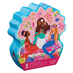 Explore an underwater fantasy with the "Mermaid Dreams 36 Piece Puzzle" by Crocodile Creek. It showcases three enchanting mermaids amid sea creatures and vibrant coral, promising a magical and engaging experience.