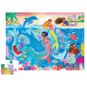 Immerse yourself in the Crocodile Creek Mermaid Dreams 36 Piece Puzzle, a vivid jigsaw puzzle featuring an underwater fantasy of mermaids and sea creatures. This captivating ocean scene, brought to you by Crocodile Creek, showcases vibrant coral, fish, a dolphin, and a whale shark swimming gracefully as they await the final piece.