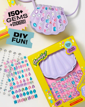 The Super Smalls Mermaid Gemify Purse kit includes a purple shell-shaped kids bag, over 150 colorful gem stickers for decorating, and comes with packaging that displays gem sheets and easy instructions.