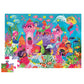 A vibrant floor jigsaw puzzle by Crocodile Creek, featuring an underwater fantasy scene with mermaids, colorful fish, and the majestic Mermaid Palace from the Crocodile Creek Mermaid Palace 36 Piece Puzzle set is missing one piece.