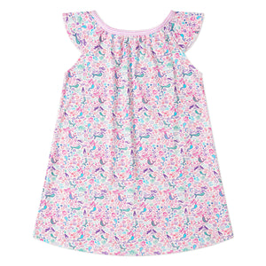 The Joy Street Girls’ Mermaids Emilia Lounge Dress features ruffled shoulders, a pink and white design with floral, bird, and sea creature prints, plus a playful hidden message in a bottle.