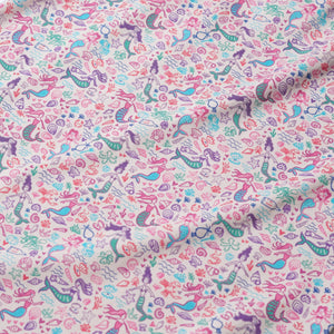 Joy Street's Girls' Mermaids Emilia Lounge Dress features colorful, wavy fabric with whimsical mermaids and sea creatures in pink, purple, teal, and red on a white background.