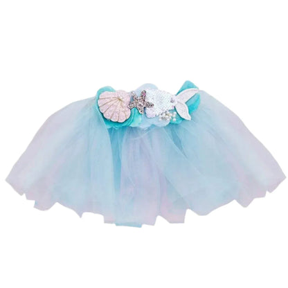 Great Pretenders Mermalicious Tutu in light blue tulle, embellished with seashell, starfish, and ocean-pearl decorations on the waistband.