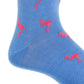 This close-up highlights the Dapper Classics Flamingo Cotton Mid Calf Sock in Azure Blue with Coral. Crafted from luxurious mercerized cotton, it features a playful pattern of pink flamingos. Made in the USA, this vibrant sock combines style and comfort effortlessly.