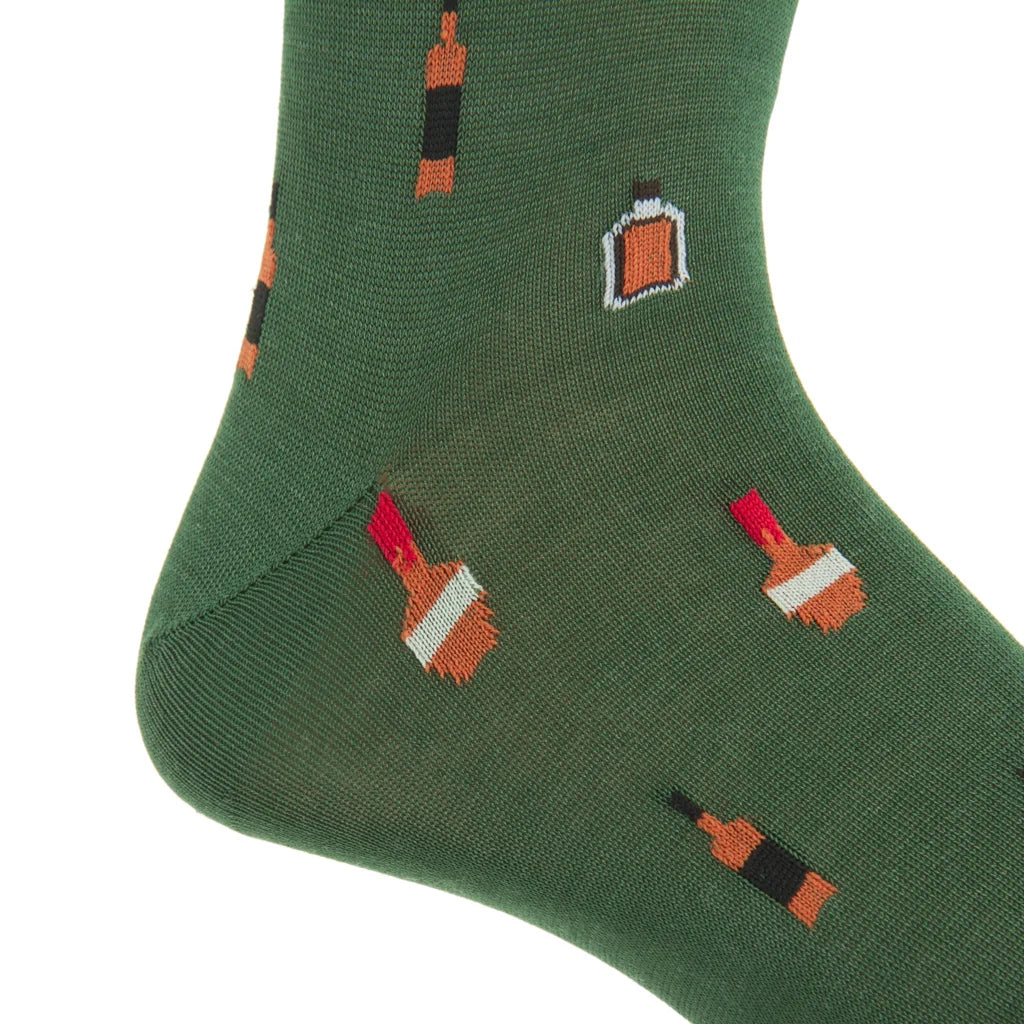The Dapper Classics Pine Green Bourbon Bottles Mid Calf Sock features a stay-up fit and is decorated with a pixel art-style pattern of liquor bottles and glasses filled with brown liquid.