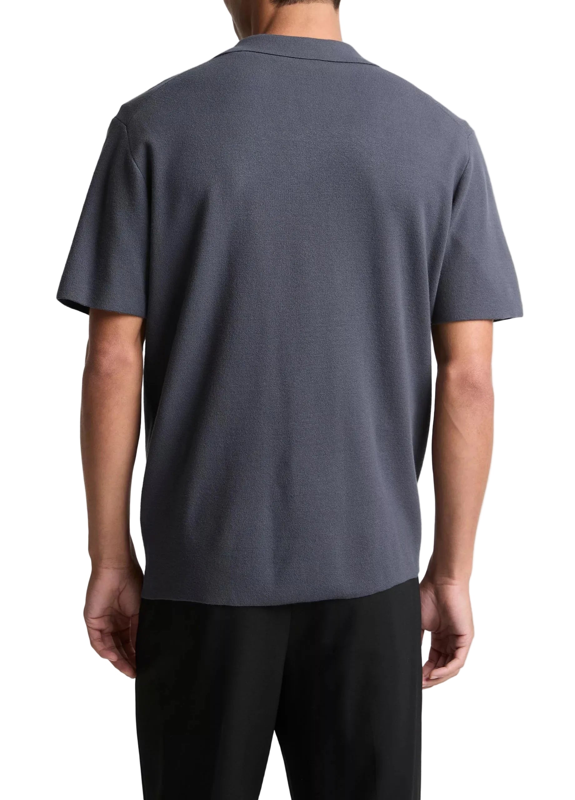 A man is shown from the back against a white background, wearing the vince Milano Shortsleeve Cabana shirt in dark gray with black pants.